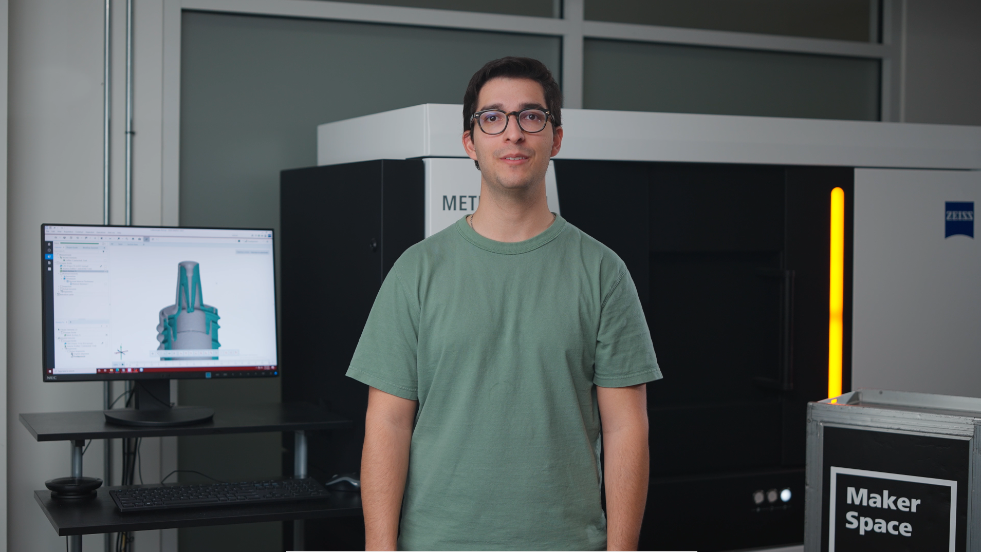 Man standing in front of a x-ray machine